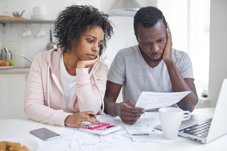 Couple managing family budget together.