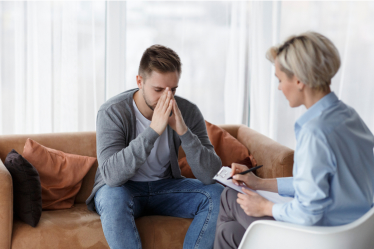 Man talking to a Psychologist.