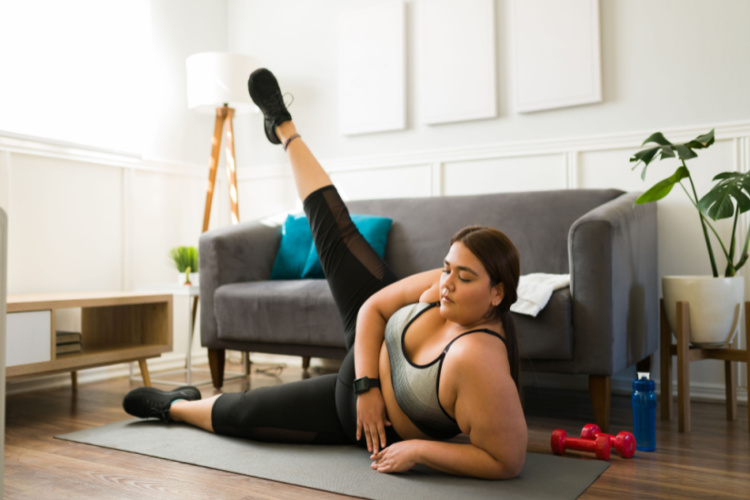 Motivated woman training with a cardio workout.