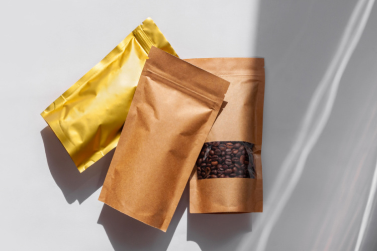 Kraft paper and foil pouch bags with coffee beans