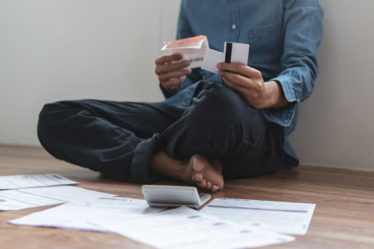 stressed man trying to find money