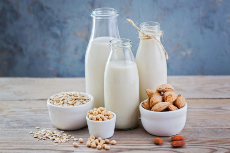 dairy free milk drink and ingredients for breakfast - food and drink